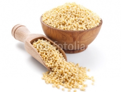 millet_in_a_wooden_bowl_isolated_on_white.jpg