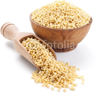 millet_in_a_wooden_bowl_isolated_on_white.jpg